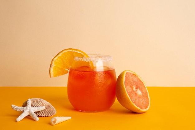 Summertime vibes with cocktail and starfish